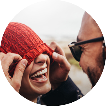 Smiling woman wearing a red hat